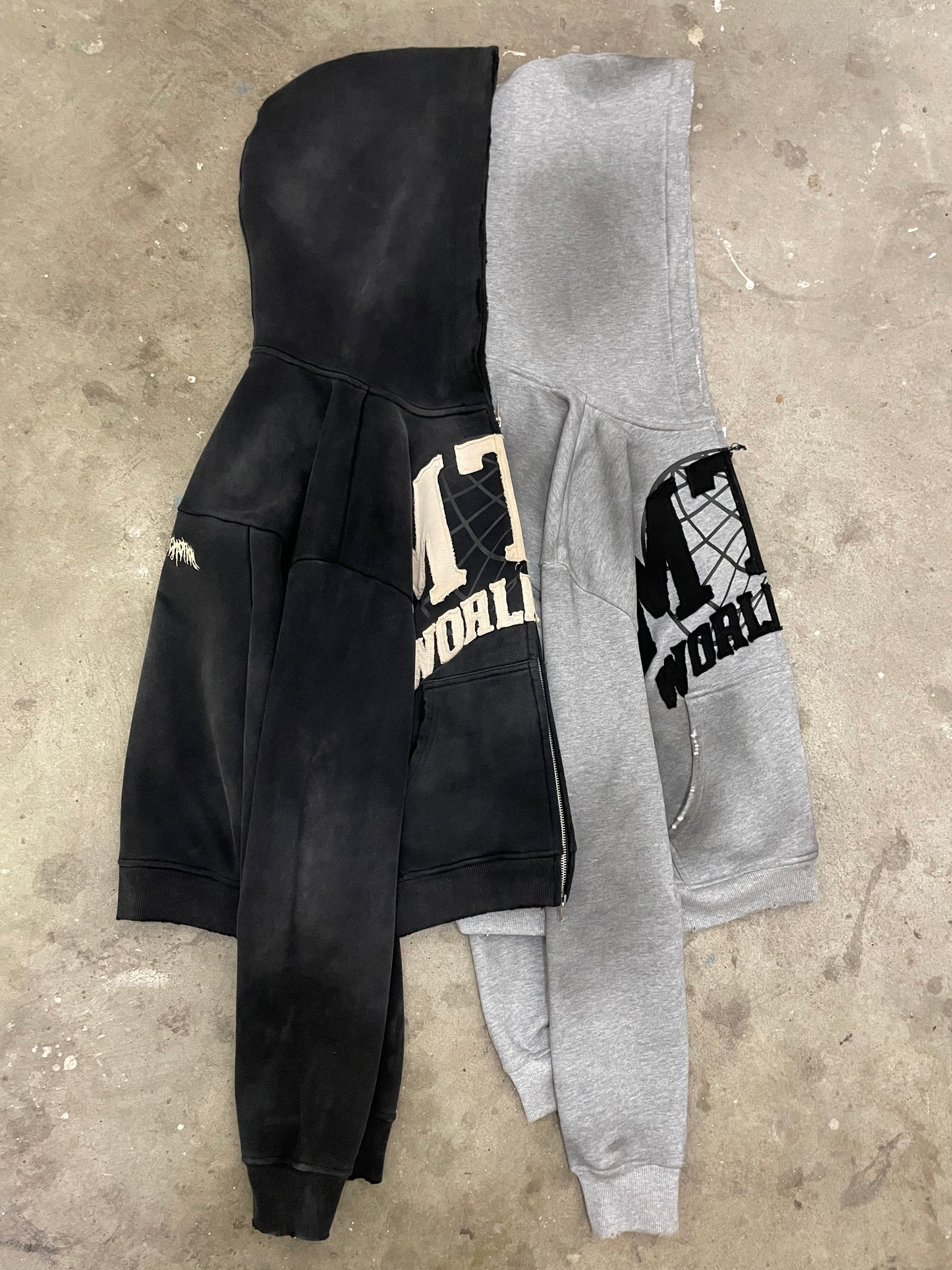 “MTN WRLDWIDE” Black Washed Zip-Up Hoodie