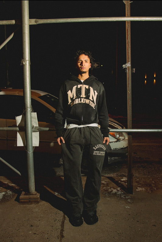 “MTN WRLDWIDE” Black Washed Zip-Up Hoodie